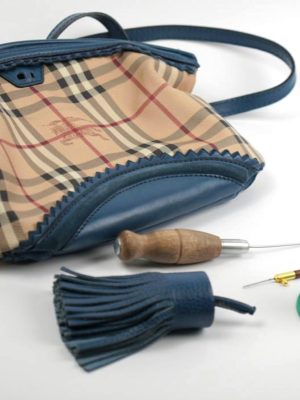 Naprawa torebki burrbery